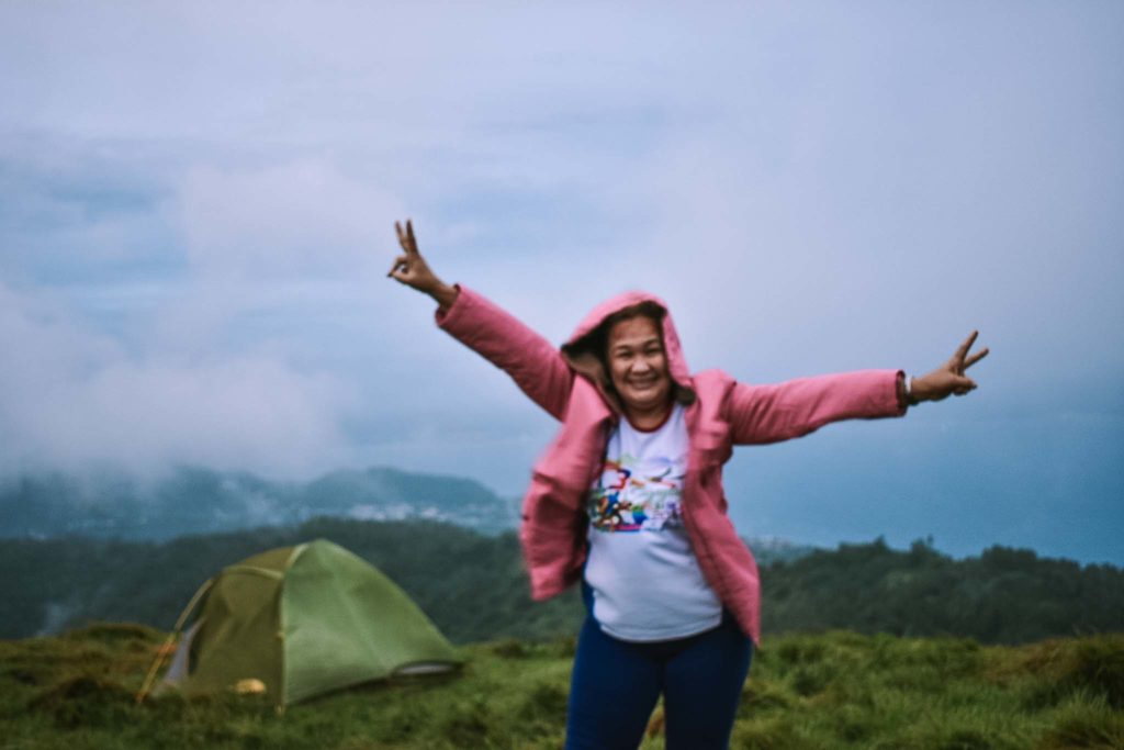 My mom at the campsite of Mt. Gulugod Baboy